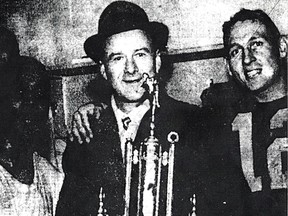 Edmonton Eskimos players Rollie Miles, left, and Jackie Parker, right, flank club president Gordon Wynn holding Taylor Memorial Trophy for winning the West Final.