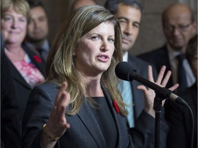 Rona Ambrose speaks after being named as the interim leader of the Conservative party following a caucus meeting Thursday Nov. 5, 2015, in Ottawa.