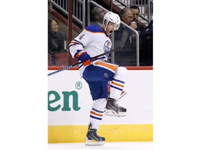 Edmonton Oilers' Taylor Hall celebrates his goal against the Arizona Coyotes during the first period of an NHL hockey game Thursday, Nov. 12, 2015, in Glendale, Ariz.