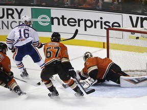 Right-winger Teddy Purcell flips a backhand shot over Anaheim Ducks goalie Frederik Andersen to give the Edmonton Oilers a 4-3 overtime win on Wednesday, Nov. 11, 2015, in Anaheim.
