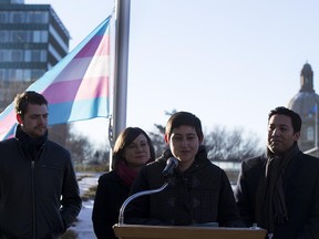From left, Michael Connolly, MLA for Calgary-Hawkwood; Status of Women Minister Shannon Phillips, Estefania Cortes-Vargas, MLA for Strathcona-Sherwood Park; and Ricardo Miranda, MLA for Calgary-Cross, prepare to raise the Transgender Pride flag at the Alberta legislature on Nov. 20, 2015.