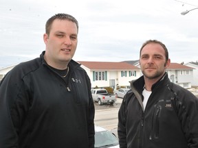 Stephen Goosney, left, and Tommy Larkin are photographed in Corner Brook, N.L., on March 29, 2010. The biological brothers, who spent years looking for each other after they were adopted separately, were reunited after discovering they were living on the same street.