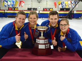 From left, skip Mick Lizmore, third Sarah Wilkes, second Brad Thiessen and lead Alison Kotylak of the Saville Centre won the Canadian mixed curling championship on Nov. 14, 2015, at the Weston Golf & Country Club in Toronto.