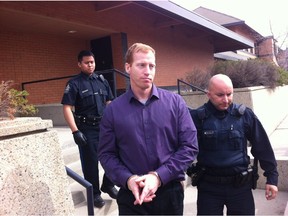Travis Edward Vader leaves the Edson courthouse on May, 15, 2012 after making an appearance on two counts of first-degree murder of Marie and Lyle McCann.