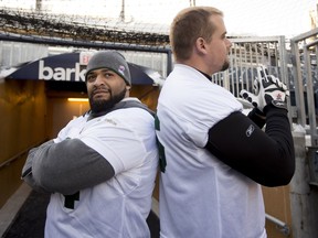 Edmonton Eskimos offensive linemen Andrew Jones, left, and Matthew O'Donnell are ready to play in the Grey Cup game at Investors Group Field in Winnipeg on Nov. 29, 2015.