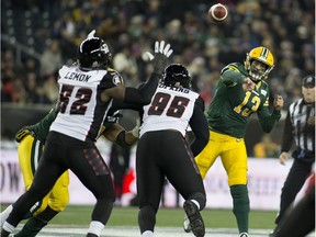 Edmonton Eskimos  quarterback Mike Reilly (13) throws a pass against the Ottawa Redblacks during the 103rd Grey Cup on Nov. 29, 2015 in Winnipeg.