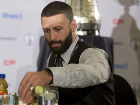 Quarterback Mike Reilly  from the Western Division champion Edmonton Eskimos takes part in a team lunch that included the Grey Cup on Nov. 26, 2015 in Winnipeg.