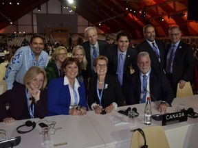 Alberta Premier Rachel Notley, left, poses with the Canadian delegation at the COP21 climate talks in Paris on Nov. 30, 2015. Photo: Patrick Lachance, Government of Quebec.