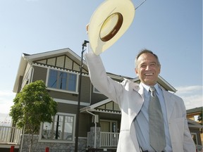 In this June 29, 2004 file photo, Avi Amir stands in front of the 2004 Stampede Dream Home built by his Homes by Avi.