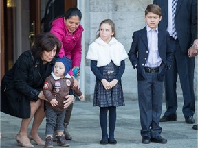 Nanny Marilou Trayvilla, second from the left, and grandmother Margaret Trudeau watch the three Trudeau children in this Nov. 4, 2015 file photo in Ottawa.