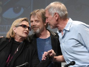 Actors Carrie Fisher, Mark Hamill, and Harrison Ford at Comic-Con International in San Diego to promote the new Star Wars movie.