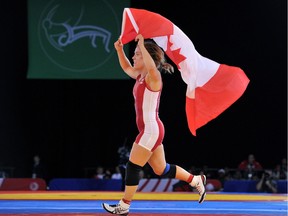 Wrestler Danielle Lappage celebrates her gold-medal win at the Commonwealth Games in Glasgow in July 2014.