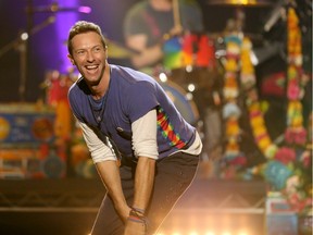 Chris Martin of Coldplay performs at the American Music Awards on Sunday, Nov. 22, 2015 in Los Angeles.