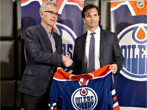 Edmonton Oilers general manager Craig MacTavish introduces the new head coach of the Edmonton Oilers, Dallas Eakins on June 10, 2013.