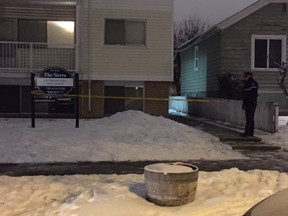 Homicide detectives investigate the shooting death of Yvette Lydia Morin, 28, at 106th Street and 107th Avenue on Dec. 12, 2015.