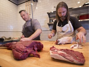 EDMONTON, AB.-- Blair Lebsack, left, and Kevin Kossowan organized a wild game dinner at RGE RD.