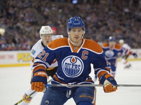Andrew Ference  of the Edmonton Oilers playing  the Calgary Flames at Rexall Place. Ference has seen very little ice time during games this season.