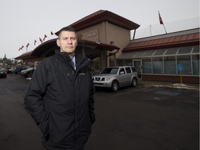 Sgt. Neil Zurawell with the Edmonton Police Service's missing persons unit continues to work on a case from 1979 where a man collapsed in a Safeway store (now Lucky 97) and later died in hospital. The man has never been identified and was buried without anyone knowing his name. Taken on December 8, 2015 in front of the Lucky 97 grocery store in Edmonton. (Greg Southam-Edmonton Journal)