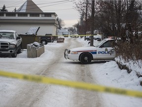 Police are investigating in an alley south of 82nd Avenue near 80th Street behind a row of walk-up apartment buildings after a man was found unconscious in Edmonton on Monday Dec. 28.
