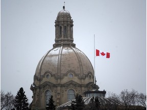 Falling snow accumulates on the dome of the Provincial Legislature Building in Edmonton.