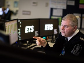 Superintendent David Keogh at his computer in the main Edmonton Transit System control room. ETS has embraced live GPS 'Smart Bus' technology.