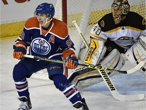 Edmonton Oilers' Ryan Nugent-Hopkins parks in front of Boston Bruins goalie Tuukka Rask during NHL action at Rexall Place on Dec. 2, 2015.