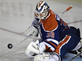 Edmonton Oilers goalie Anders Nilsson (39) makes a save against the Dallas Stars during NHL action at Rexall Place in Edmonton, Dec. 4, 2015.