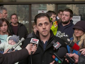 Nick Kwiatkoski, brother of John Kwiatkowski speaks to the media with family behind him after a life sentence for second-degree murder decision was made in the case of the murder of John Kwiatkowski in Edmonton on Dec. 9, 2015.