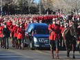 RCMP officers attend the funeral procession for slain RCMP Constable David Wynn, in St. Albert on Jan. 26, 2015.