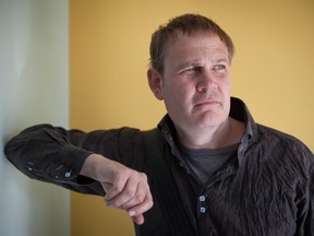 Youth worker Mark Cherrington poses for a photo at the Edmonton Food Bank on June 4, 2014.