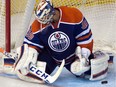 Goaltender Anders Nilsson (39) makes a save as the Edmonton Oilers play the San Jose Sharks at Rexall place in Edmonton, Dec. 9, 2015.