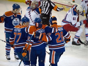 The Edmonton Oilers celebrate a goal during their 7-5 victory over the  New York Rangers at Rexall Place on Friday, December 11, 2015.