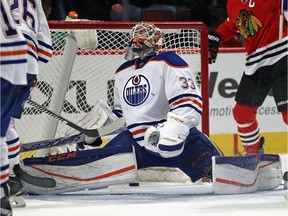 The puck slips under  the legs of Edmonton Oilers  goalie Cam Talbot on a third period goal by Teuvo Teravainen of the Chicago Blackhawks at the United Center on Dec. 17, 2015 in Chicago. The Blackhawks defeaed the Oilers 4-0.
