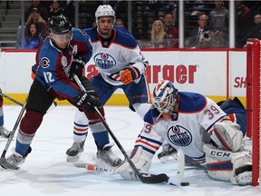 DENVER, CO - DECEMBER 19:  Goalie Anders Nilsson #39 of the Edmonton Oilers makes a save on a shot by Jarome Iginla #12 of the Colorado Avalanche as Darnell Nurse #25 of the Edmonton Oilers follows the play at Pepsi Center on December 19, 2015 in Denver, Colorado.