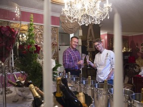 Event planner Randall MacDonald (left) and chef Nathin Bye say champagne pairs beautifully with a wide variety of foods. Shaughn Butts/ Edmonton Journal