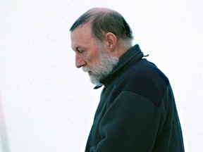 Eric Dejaeger leaves an Iqaluit, Nunavut courtroom on Jan. 20, 2011.