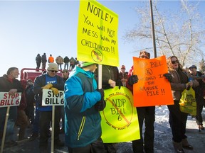 Protesters against Bill 6 gather outside of the Harvest Centre at Westerner Park in Red Deer on Tuesday, Dec. 1, 2015.