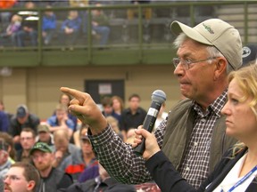 Vulcan-area farmer Gary Flitton asks questions of the panel during a consultation meeting on Bill 6 in Leduc on Monday.