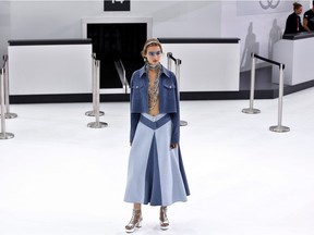 A model presents a creation for Chanel  during the 2016 Spring/Summer ready-to-wear collection fashion show, on Oct. 6, 2015 at the Grand Palais in Paris. All things denim is a hot trend for spring 2016.