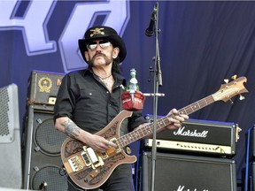 This file photo taken on June 19, 2015 shows Motorhead's singer and bassist, Lemmy Kilmister, performing during the Hellfest heavy metal and hard rock music festival Hellfest in Clisson, near Nantes, western France. Ian "Lemmy" Kilmister, the frontman of iconic British heavy metal band Motorhead, has died aged 70 of a sudden, aggressive cancer, the group said on Dec. 29, 2015.