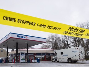 Homicide detectives investigate at a Mac's convenience store in Edmonton on Friday, Dec. 18, 2015.