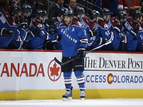 Colorado Avalanche right wing Jarome Iginla, front, is congratulated by teammates after scoring a goal against the New Jersey Devils in March 2015, in Denver. Iginla is three goals away from hitting the 600-goal mark.