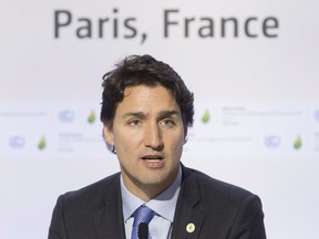 Canadian Prime Minister Justin Trudeau speaks during a news conference at the United Nations climate change summit Nov. 30, 2015 in Le Bourget, near Paris, France.