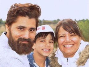 Karanpal Singh Bhangu, 35, is shown with his son Royce and his wife Kiran.