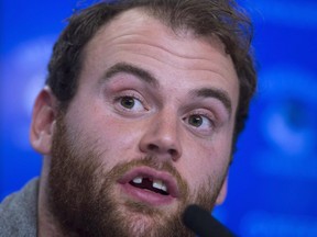 FILE - Vancouver Canucks winger Zack Kassian attends a news conference in Vancouver, B.C. Monday April 27, 2015.