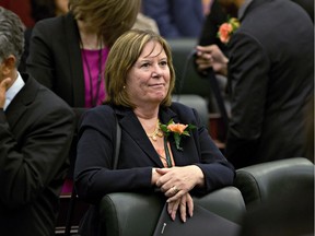 Alberta's energy minister Marg McCuaig-Boyd has been silent on the government's court action about power agreements.