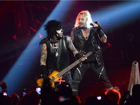 Nikki Sixx and Vince Neil perform  onstage during Motley Crue: The Final Tour at Barclays Center of Brooklyn on Aug. 12, 2015.