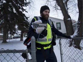 Greg Mady is back delivering mail after being hit while working the same route in Edmonton last year.
