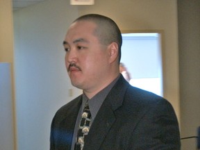 Const. Elvin Toy leaves a disciplinary hearing in 2006.