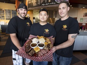 Memphis Blues Barbeque House manager Mike Byers (left) along with owners Jonathan Ip (middle) and James Braun (right)